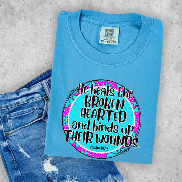 He heals the broken hearted and binds  COMPLETED TEE - Wholesale